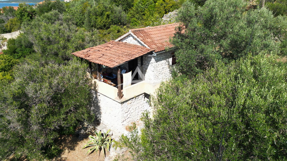 MALA RAVA - CHARMING STONE HOUSE FOR SALE IN THE FIRST ROW TO THE SEA